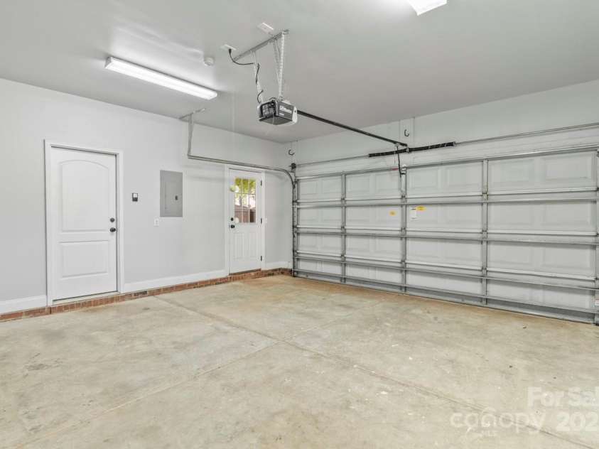 13206 Meadowmere Road, Huntersville, NC 28078.  MLS# CAR4245792, YatesRealty ID 6454. Finished two car garage