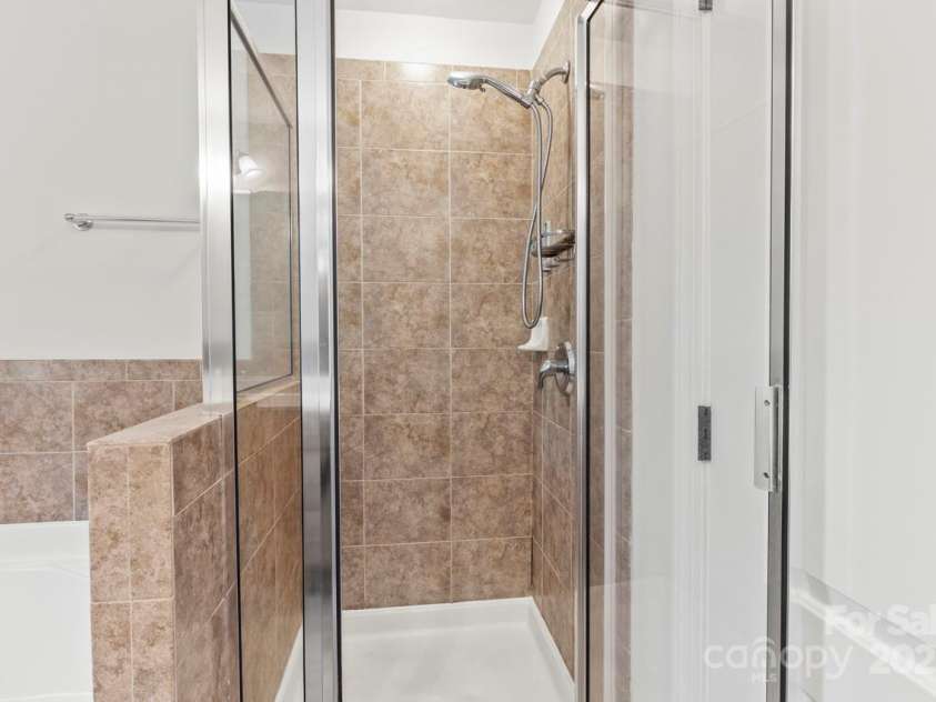 13206 Meadowmere Road, Huntersville, NC 28078.  MLS# CAR4245792, YatesRealty ID 6454. Upgraded tile shower