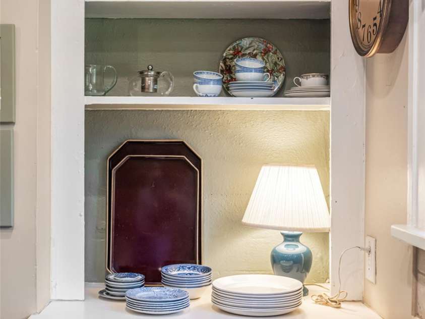 352 Justice Ridge Road, Candler, NC 28715.  MLS# CAR4357207, YatesRealty ID 6458. A thoughtful storage nook in the kitchen.