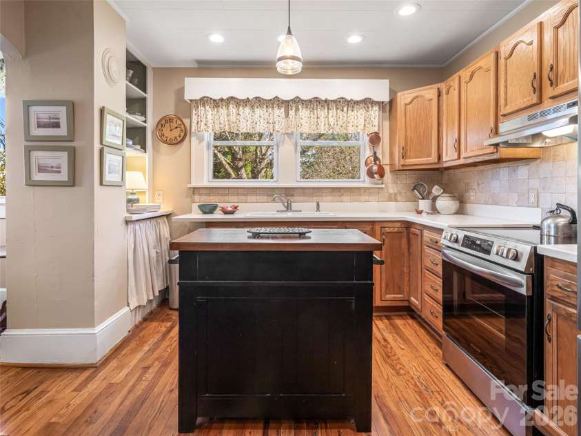 352 Justice Ridge Road, Candler, NC 28715.  MLS# CAR4357207, YatesRealty ID 6458. Enjoy bird watching while dish washing.