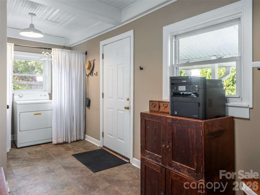 352 Justice Ridge Road, Candler, NC 28715.  MLS# CAR4357207, YatesRealty ID 6458. Laundry and pantry closet in mud room.