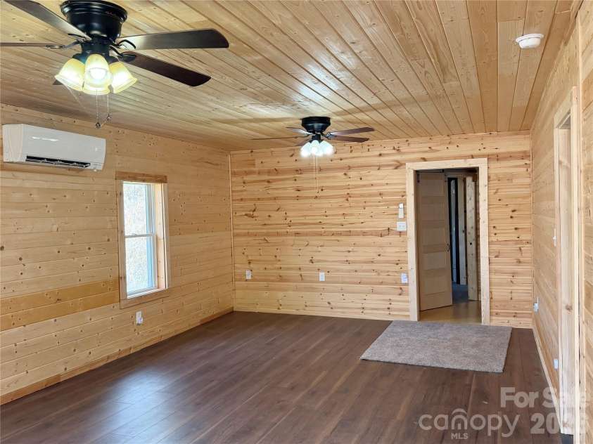 55 Summit View Drive, Marshall, NC 28753.  MLS# CAR4323108, YatesRealty ID 6462. Living room from front door entrance