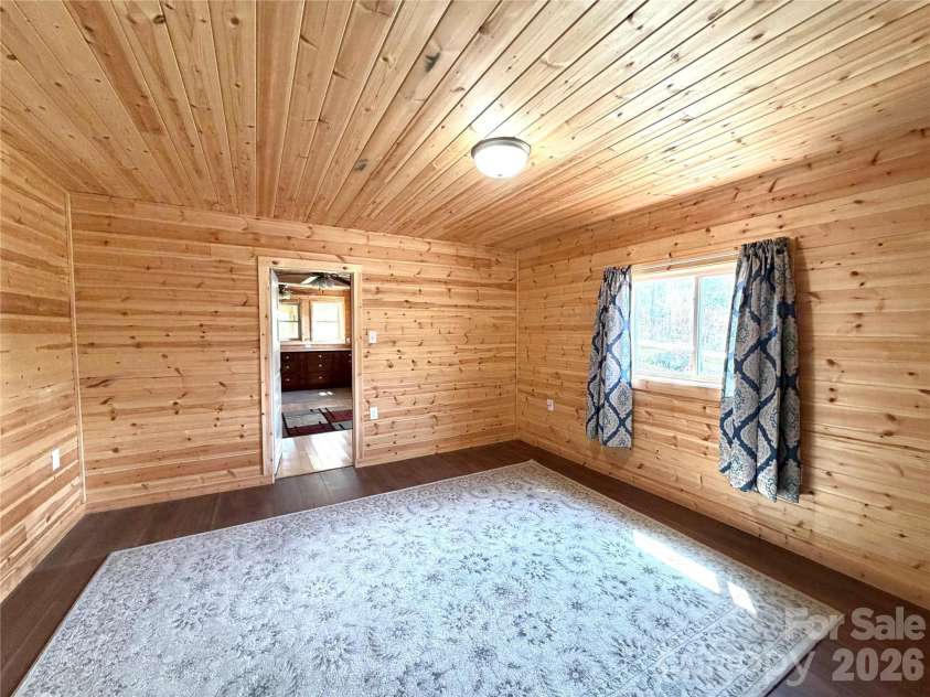 55 Summit View Drive, Marshall, NC 28753.  MLS# CAR4323108, YatesRealty ID 6462. Main bedroom looking toward kichen