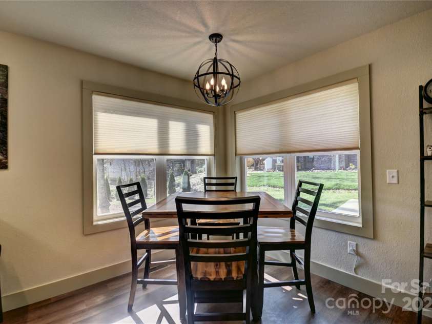 515 Twinbrook Lane, Maggie Valley, NC 28751.  MLS# CAR4245630, YatesRealty ID 6466. Dining area of the great room, lots of light