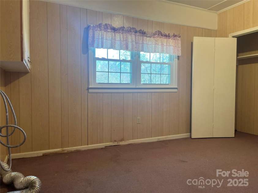 2310 Montford Avenue, Concord, NC 28027.  MLS# CAR4157430, YatesRealty ID 6469. Enclosed porch/laundry