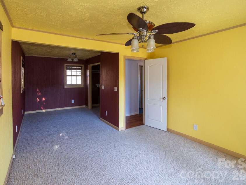 56 Vance Avenue, Black Mountain, NC 28711.  MLS# CAR4340942, YatesRealty ID 6473. Back half of top primary bedroom