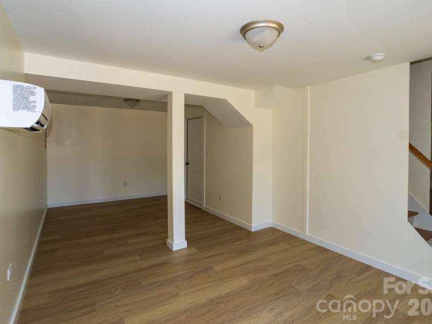 56 Vance Avenue, Black Mountain, NC 28711.  MLS# CAR4340942, YatesRealty ID 6473. Downstairs space