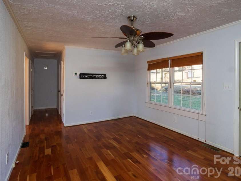56 Vance Avenue, Black Mountain, NC 28711.  MLS# CAR4340942, YatesRealty ID 6473. Looking out on Vance from living room