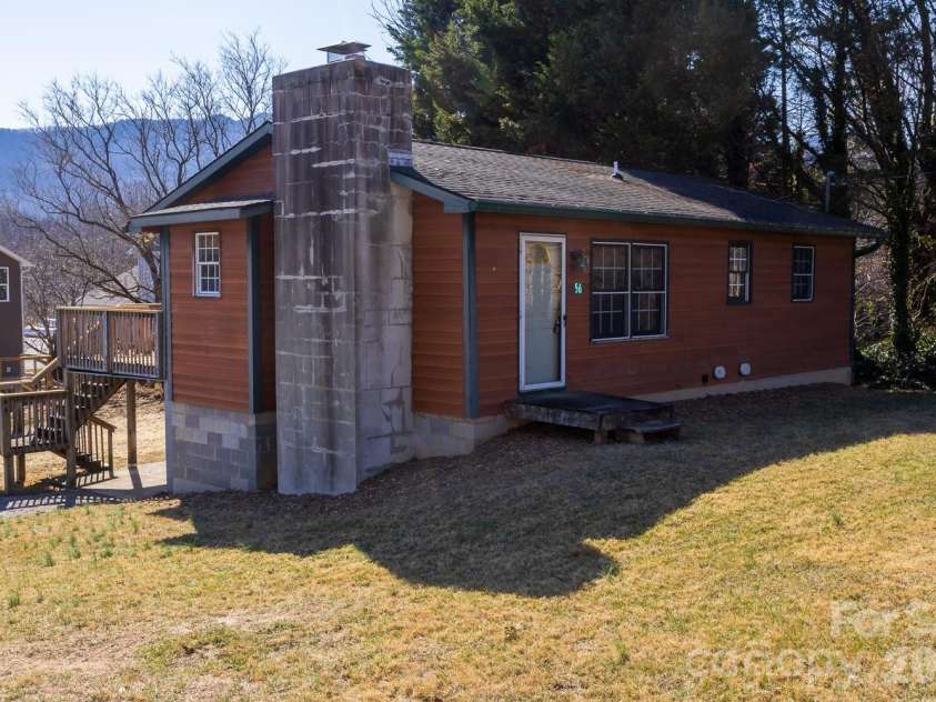 56 Vance Avenue, Black Mountain, NC 28711.  MLS# CAR4340942, YatesRealty ID 6473. Right side view. Hardboard siding!