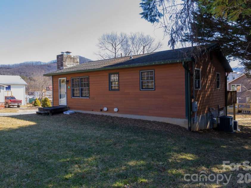 56 Vance Avenue, Black Mountain, NC 28711.  MLS# CAR4340942, YatesRealty ID 6473. View of flat back yard from Vance Ave.