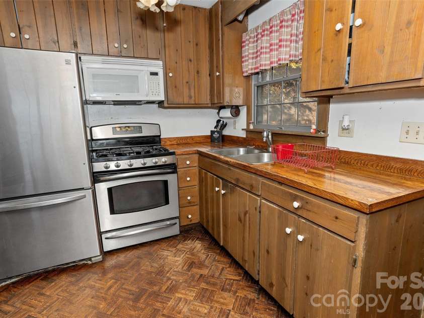 310 Log Gap Road, Fairview, NC 28730.  MLS# CAR4310874, YatesRealty ID 6475. 
