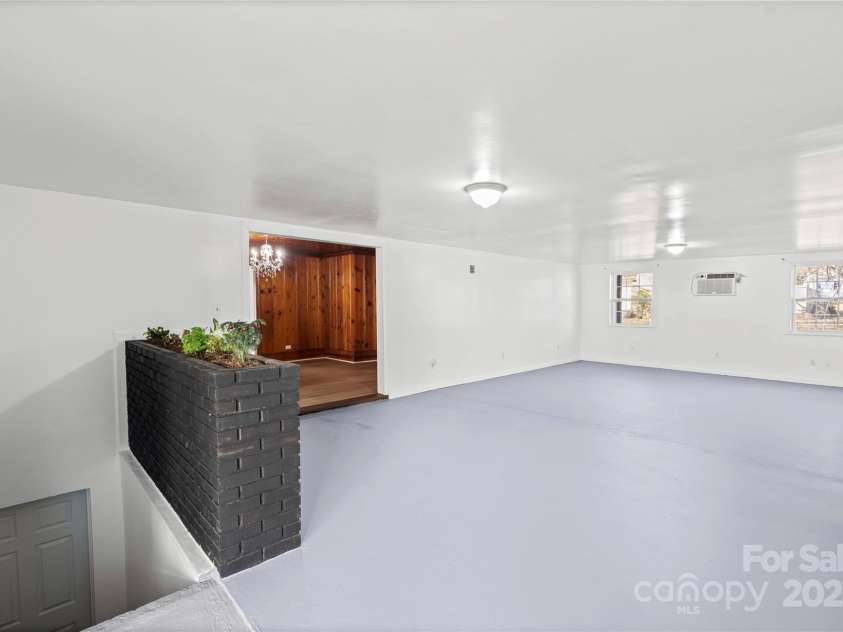 115 Texas Avenue, Bessemer City, NC 28016.  MLS# CAR4219372, YatesRealty ID 6481. Srairs to basement
