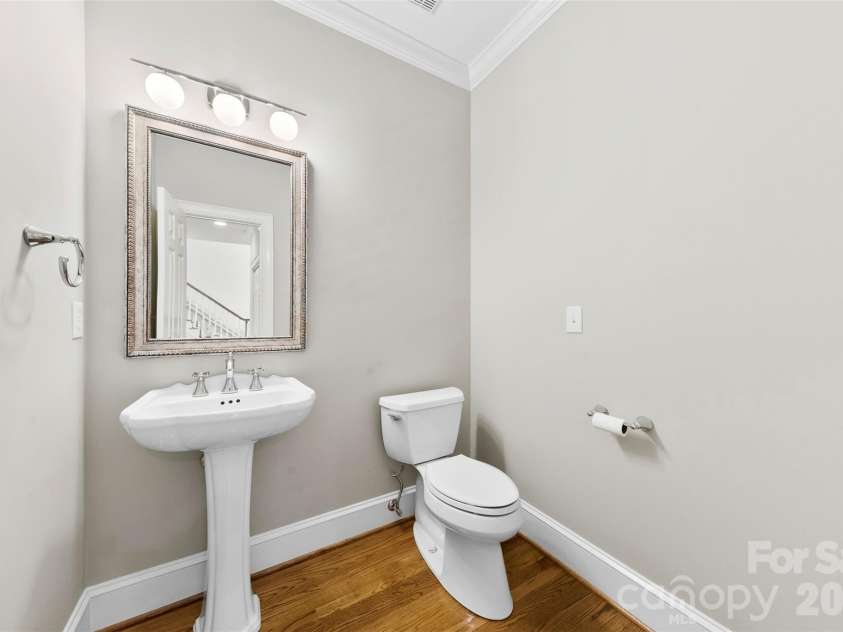 8934 Challis Hill Lane, Charlotte, NC 28226.  MLS# CAR4356123, YatesRealty ID 6483. Downstairs half bath