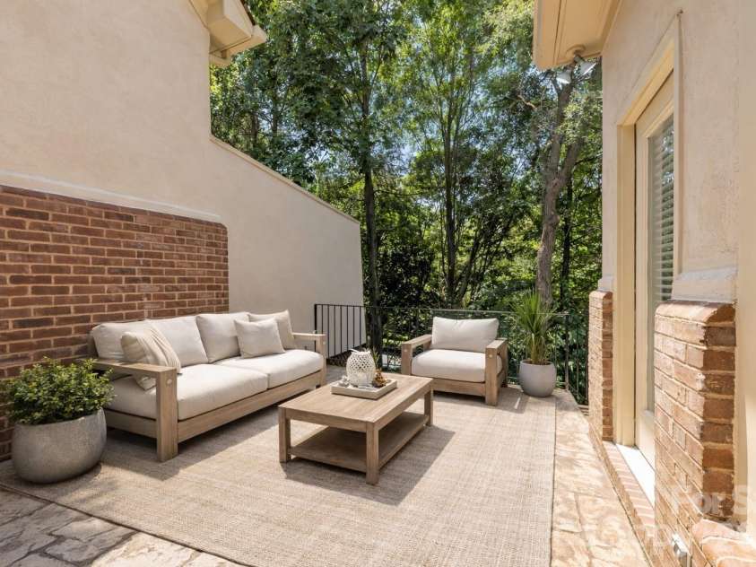 8934 Challis Hill Lane, Charlotte, NC 28226.  MLS# CAR4356123, YatesRealty ID 6483. Virtually staged back patio