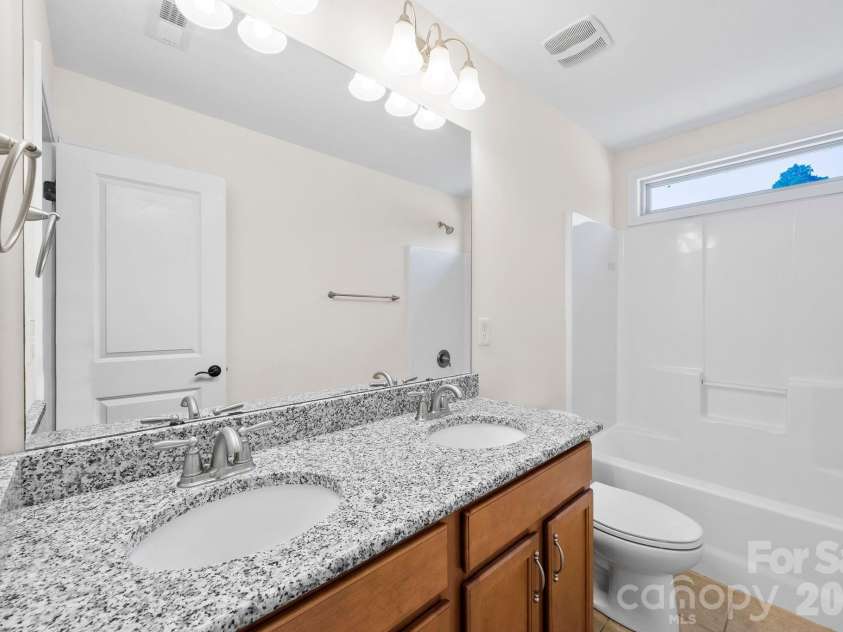 7140 Streamhaven Drive, Harrisburg, NC 28075.  MLS# CAR4357451, YatesRealty ID 6485. 