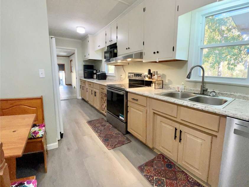 240 Hamrick Road, Mooresboro, NC 28114.  MLS# CAR4319970, YatesRealty ID 6486. GALLEY STYLE KITCHEN