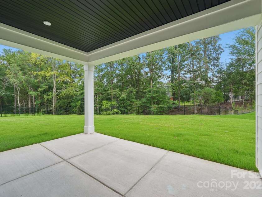 630 Hyder Trail, Tega Cay, SC 29708.  MLS# CAR4281073, YatesRealty ID 649. Covered Patio at basement