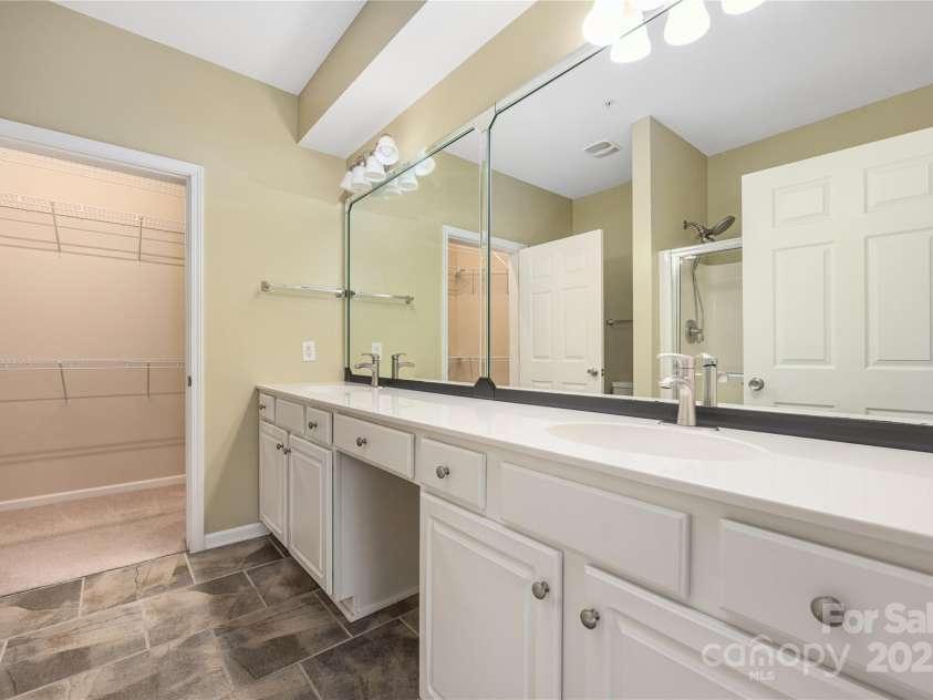 11544 Costigan Lane, Charlotte, NC 28277.  MLS# CAR4245194, YatesRealty ID 6494. Primary bath with new faucets and dual vanity