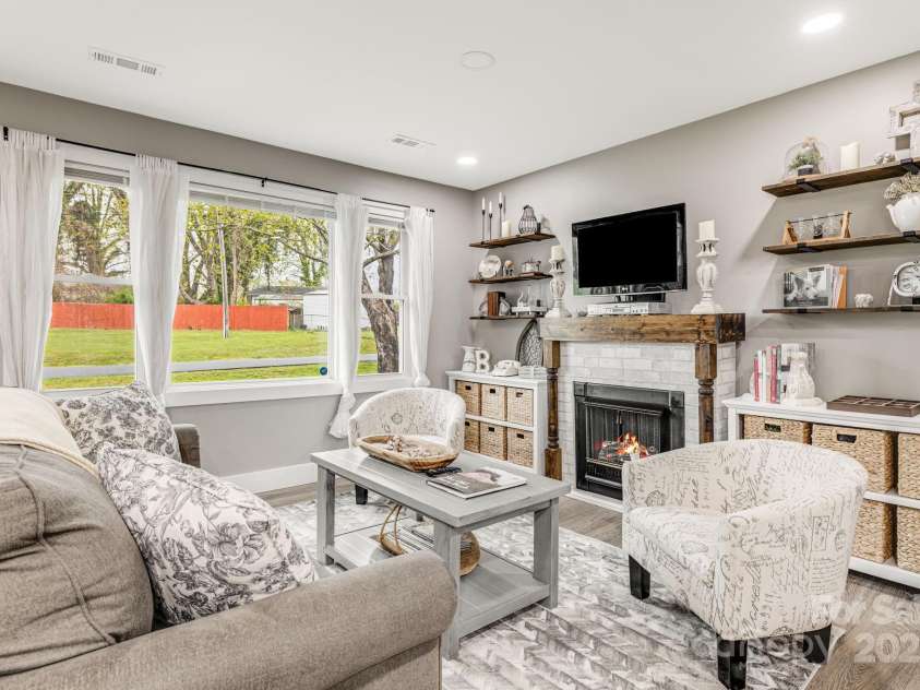 57 Maplewood Knoll Drive, East Flat Rock, NC 28726.  MLS# CAR4239967, YatesRealty ID 6497. Living room.