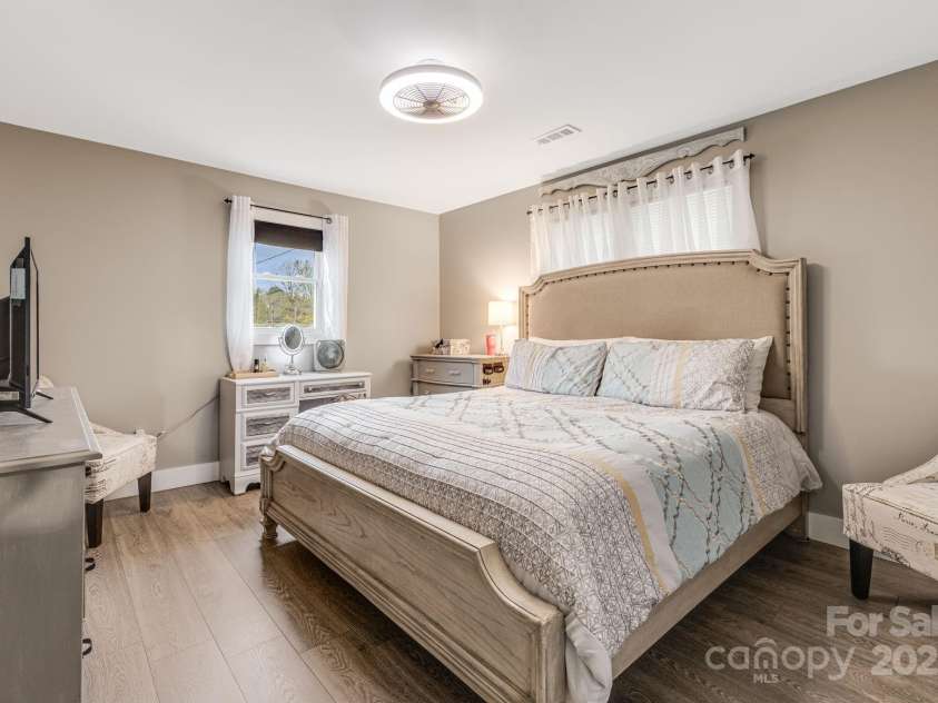 57 Maplewood Knoll Drive, East Flat Rock, NC 28726.  MLS# CAR4239967, YatesRealty ID 6497. Primary bedroom.