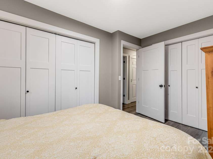 57 Maplewood Knoll Drive, East Flat Rock, NC 28726.  MLS# CAR4239967, YatesRealty ID 6497. Third bedroom has two closets.