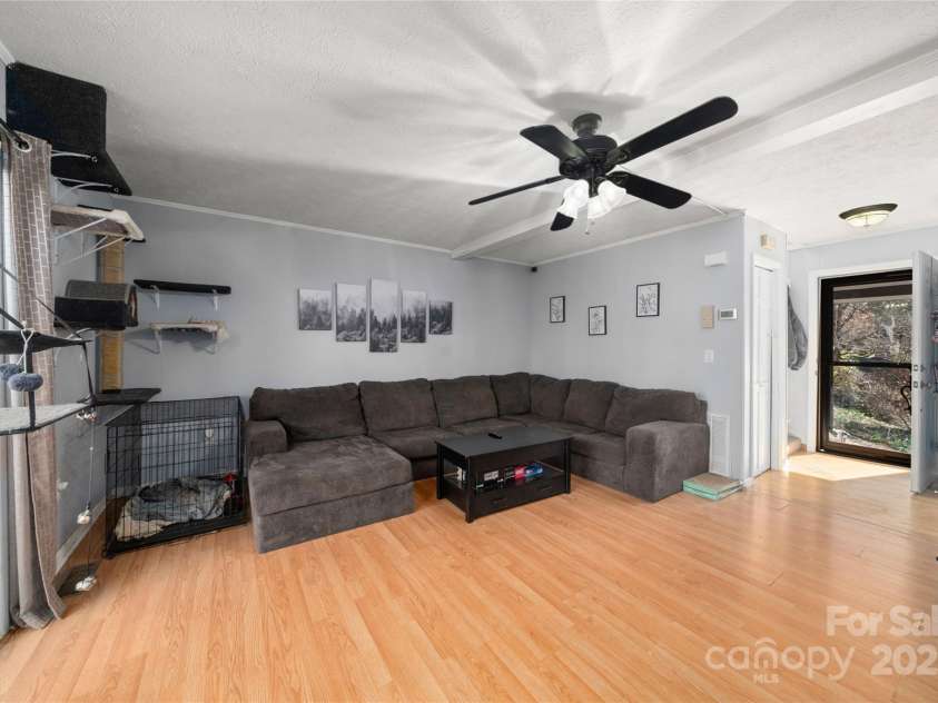 177 Forest Drive, Clyde, NC 28721.  MLS# CAR4231456, YatesRealty ID 6501. Living Room Another View