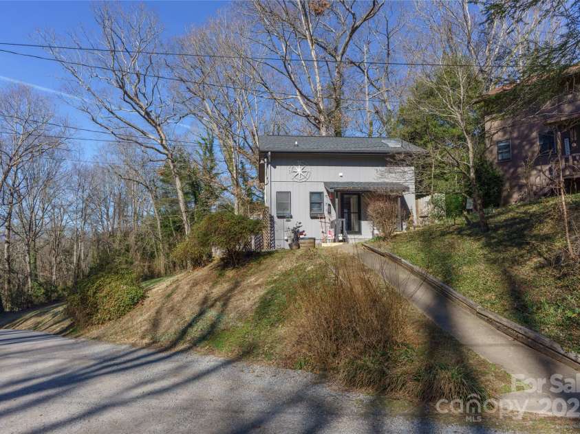 177 Forest Drive, Clyde, NC 28721.  MLS# CAR4231456, YatesRealty ID 6501. View Showing Walkway From Parking Area