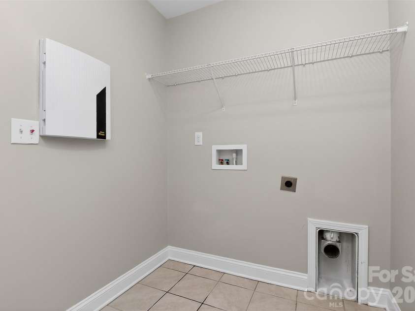 238 Johnston Drive, Pineville, NC 28134.  MLS# CAR4320235, YatesRealty ID 6501. Laundry Room Upstairs