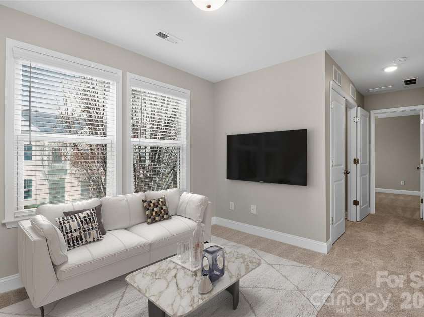 238 Johnston Drive, Pineville, NC 28134.  MLS# CAR4320235, YatesRealty ID 6501. Virtually Staged Loft on 2nd floor for flex space