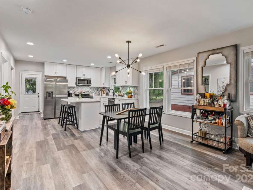 2117 Camp Greene Street, Charlotte, NC 28208.  MLS# CAR4241188, YatesRealty ID 6504. Seamless blend from kitchen to living space.