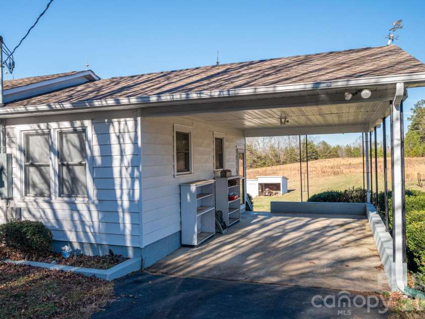 897 Calloway Road, Lincolnton, NC 28092.  MLS# CAR4329478, YatesRealty ID 6504. Attached Carport
