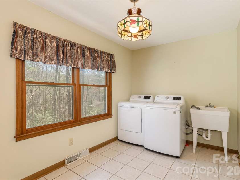 221 Timberlane Drive, Pisgah Forest, NC 28768.  MLS# CAR4356718, YatesRealty ID 6505. 