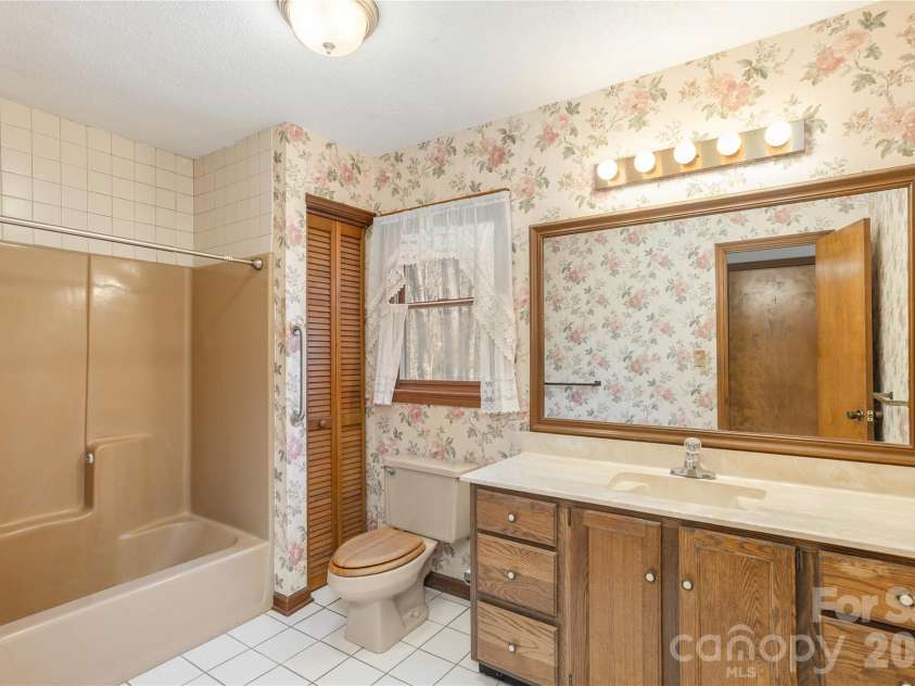 221 Timberlane Drive, Pisgah Forest, NC 28768.  MLS# CAR4356718, YatesRealty ID 6505. 