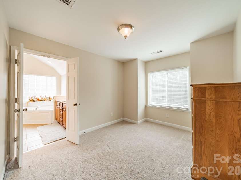 149 EdgeHill Drive, Fort Mill, SC 29715.  MLS# CAR4359843, YatesRealty ID 6507. Sitting area in primary bedroom 