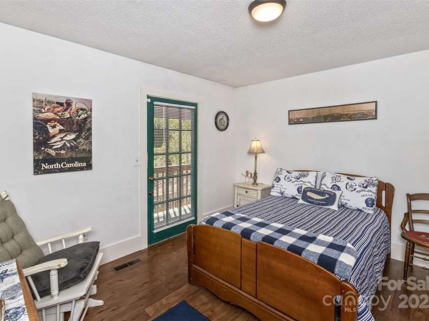 3474 Crestwood Drive, Morganton, NC 28655.  MLS# CAR4245149, YatesRealty ID 6508. Bedroom #2 leads to balcony overlooking the front yard.
