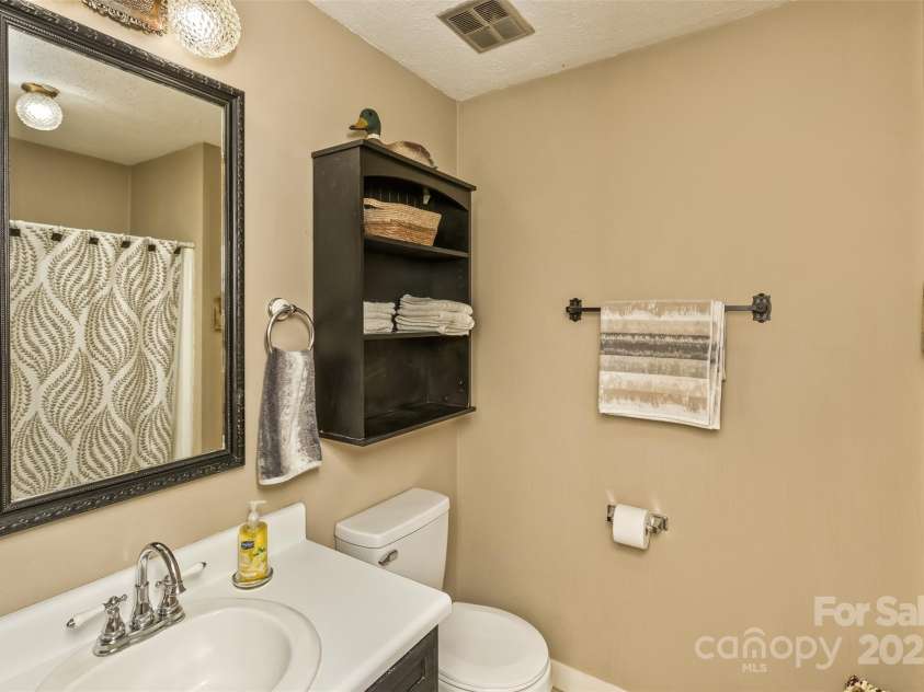 3474 Crestwood Drive, Morganton, NC 28655.  MLS# CAR4245149, YatesRealty ID 6508. Guest bath (full) offers a traditional shower.