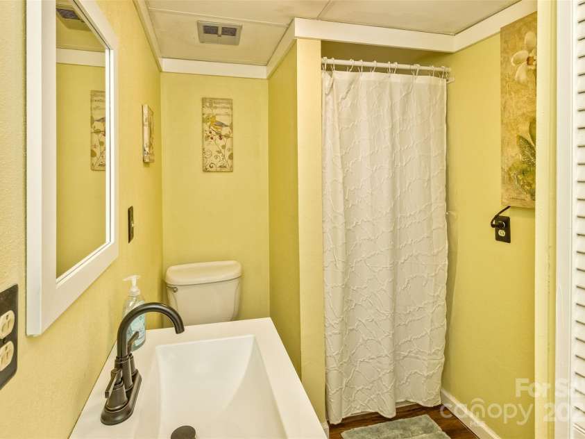 3474 Crestwood Drive, Morganton, NC 28655.  MLS# CAR4245149, YatesRealty ID 6508. Lower level full bath is perfect for guests.