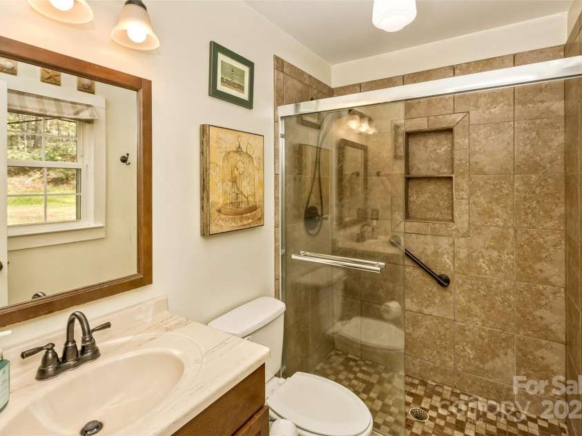 3474 Crestwood Drive, Morganton, NC 28655.  MLS# CAR4245149, YatesRealty ID 6508. Primary bath features updated walk-in shower.