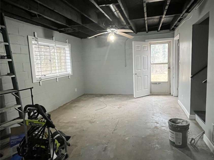 205 Main Avenue, Hildebran, NC 28637.  MLS# CAR4215338, YatesRealty ID 6510. Large basement room