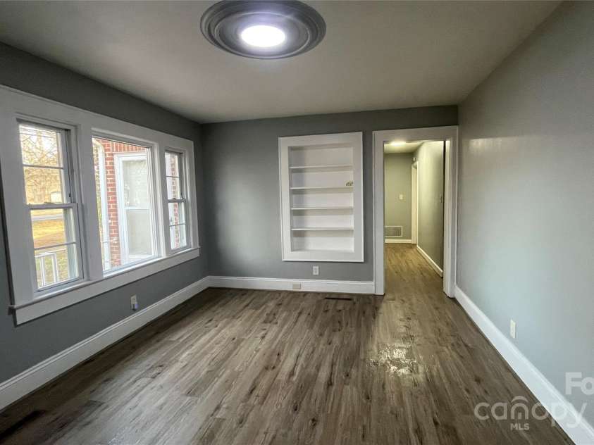 205 Main Avenue, Hildebran, NC 28637.  MLS# CAR4215338, YatesRealty ID 6510. Living room/Dining Room.