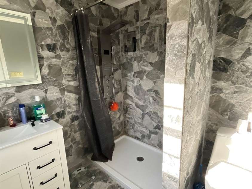 205 Main Avenue, Hildebran, NC 28637.  MLS# CAR4215338, YatesRealty ID 6510. Renovated bathroom