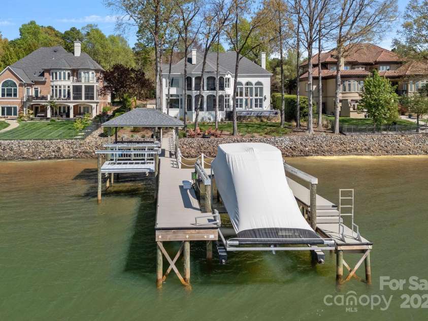 115 Jade Spring Court, Mooresville, NC 28117.  MLS# CAR4239808, YatesRealty ID 6512. Beautiful Painted Brick Home with Deep Water Dock