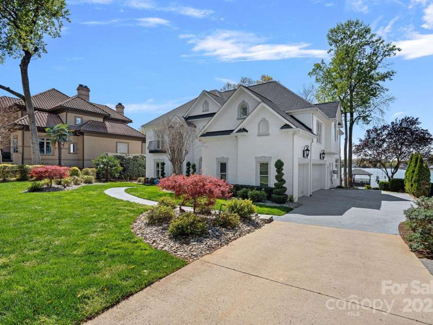 115 Jade Spring Court, Mooresville, NC 28117.  MLS# CAR4239808, YatesRealty ID 6512. Side View of Home