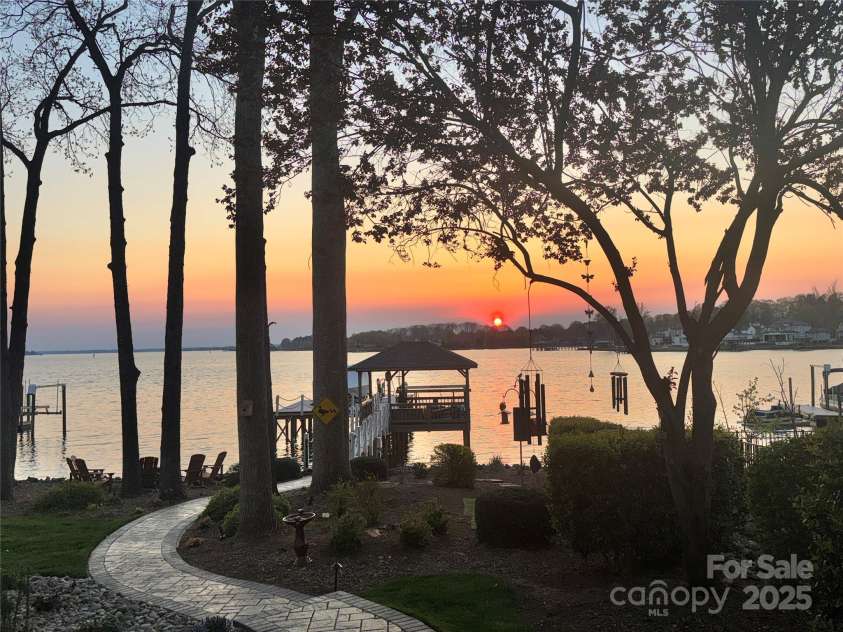 115 Jade Spring Court, Mooresville, NC 28117.  MLS# CAR4239808, YatesRealty ID 6512. Spring Sunset