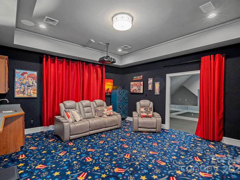 115 Jade Spring Court, Mooresville, NC 28117.  MLS# CAR4239808, YatesRealty ID 6512. Theater Room with...
