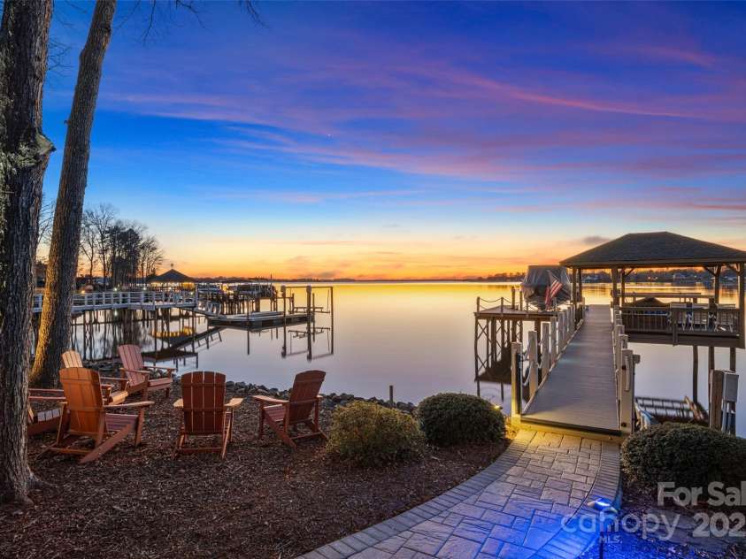 115 Jade Spring Court, Mooresville, NC 28117.  MLS# CAR4239808, YatesRealty ID 6512. Unbeatable Sunset Location On Lake Norman