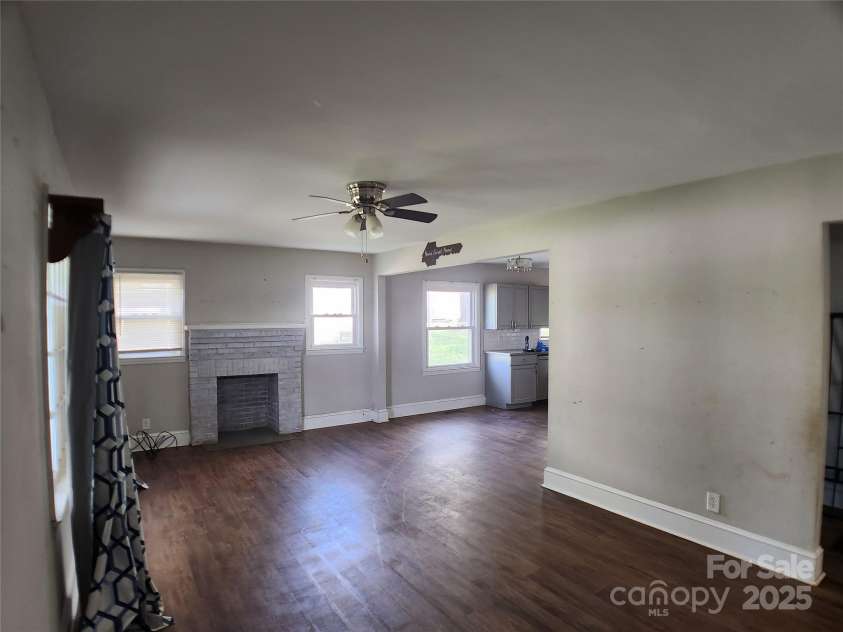 2607 Lowell Road, Gastonia, NC 28054.  MLS# CAR4245113, YatesRealty ID 6515. Living Room - Kitchen