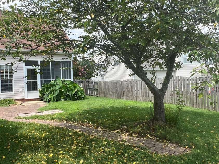 4817 Mossy Cup Lane, Monroe, NC 28110.  MLS# CAR4165542, YatesRealty ID 6519. Beautiful Fruit Tree in Backyard