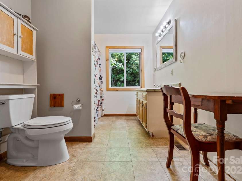658 Johnson Road, Brevard, NC 28712.  MLS# CAR4300237, YatesRealty ID 652. Primary bath