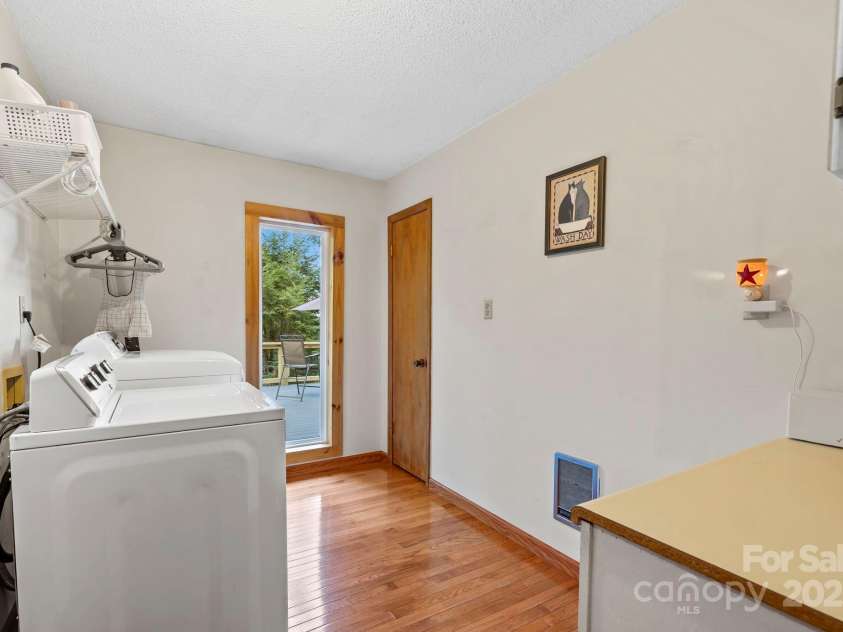 658 Johnson Road, Brevard, NC 28712.  MLS# CAR4300237, YatesRealty ID 652. Seperate laundry room with oversized window